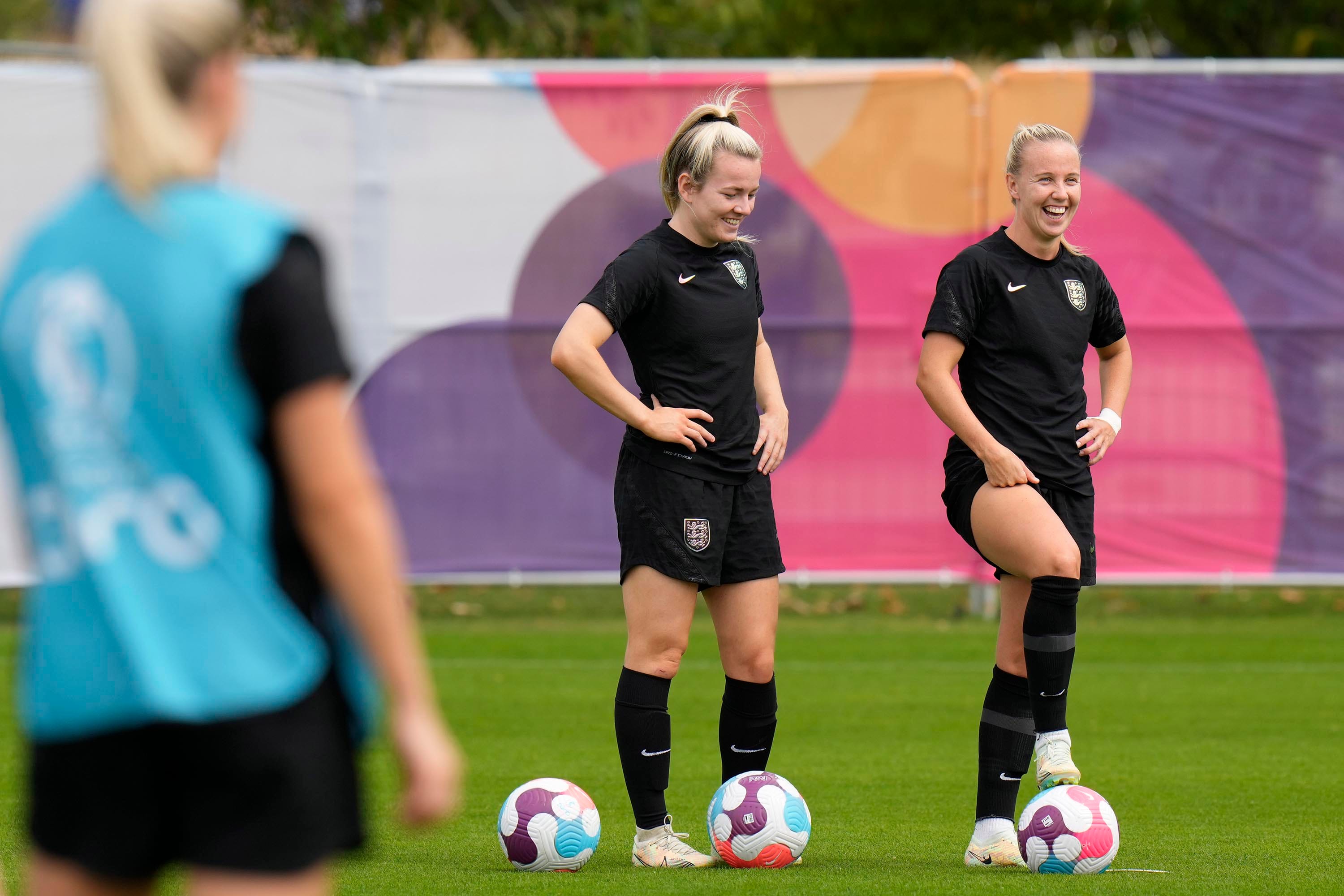 England's Lauren Hemp, and England's Beth Mead smile during a training session ahead of the Women Euro 2022 final