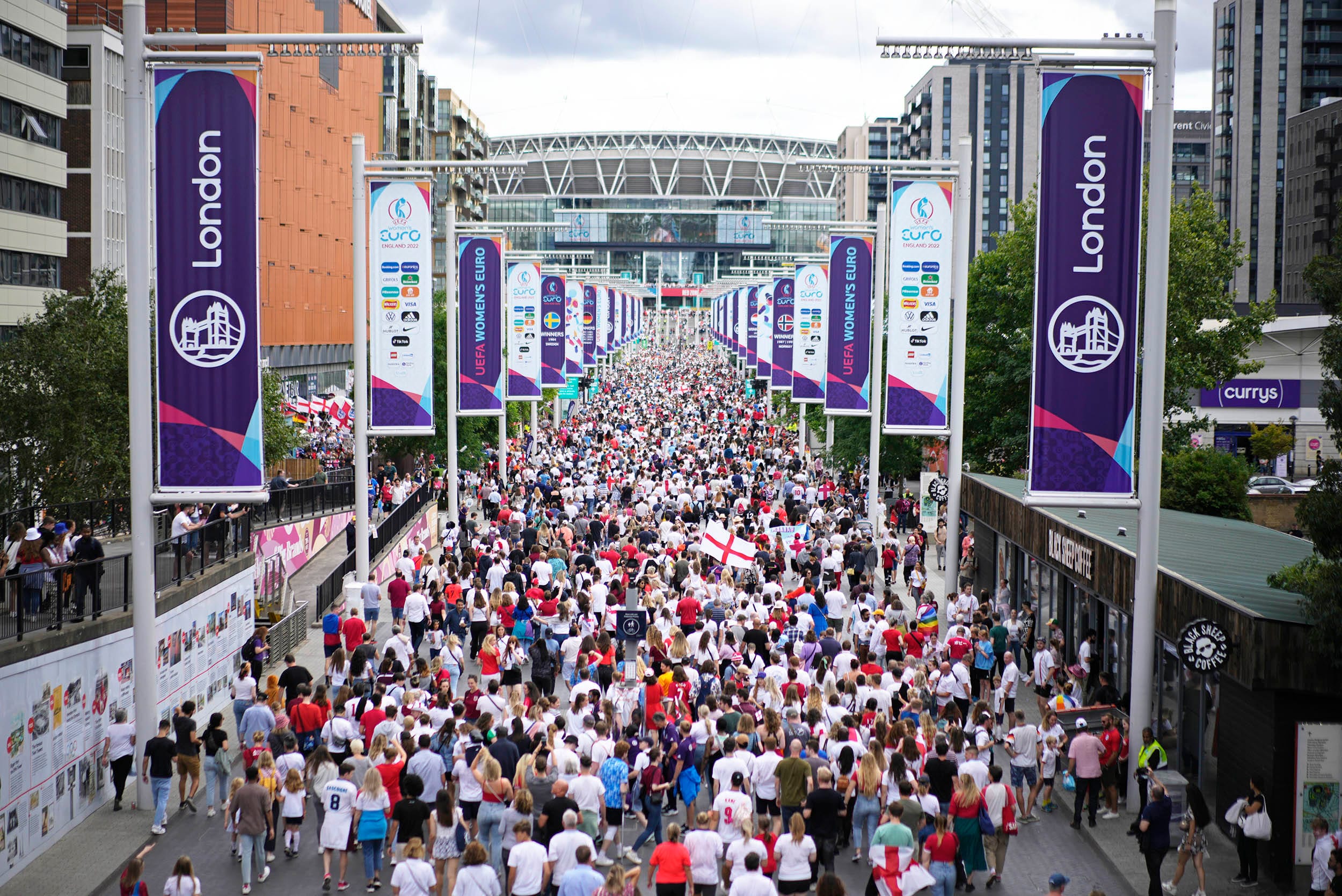 Supporters walk up Wembley Way as they arrive for the final of the Women's Euro 2022 soccer match