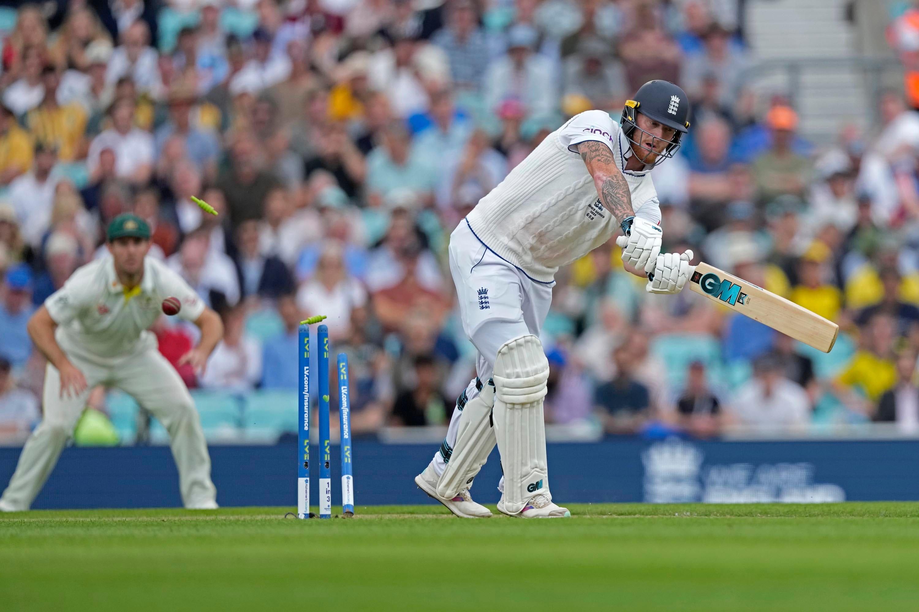 England's captain Ben Stokes is bowled out by Australia's Mitchell Starc during the first day of the fifth Ashes Test match