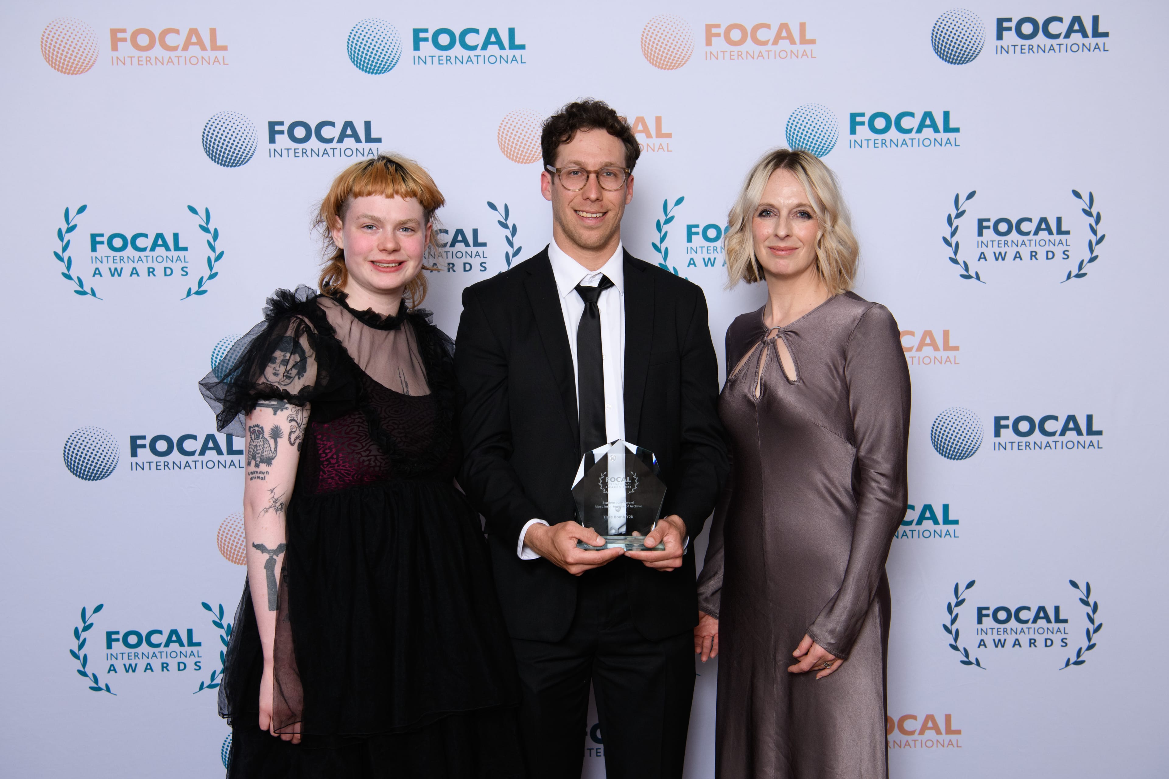 Sky's Raelene Rawlings (right) is pictured presenting the award to Peter Nauffts for Time Bomb Y2K as chosen by Molly Mills (left) and students from the National Film & Television School.